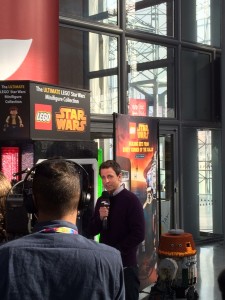 Seth Meyers filming a segment at the Toy Fair