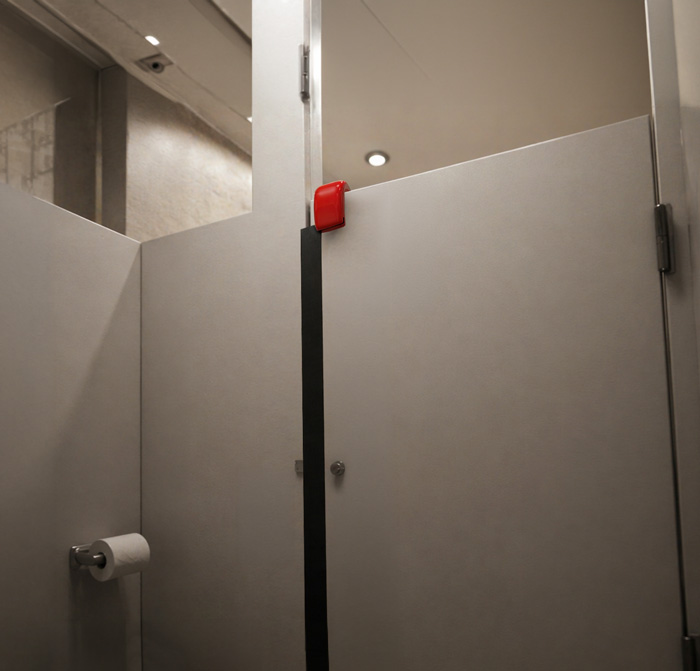 Context-1_mobile product in use securing public restroom stall