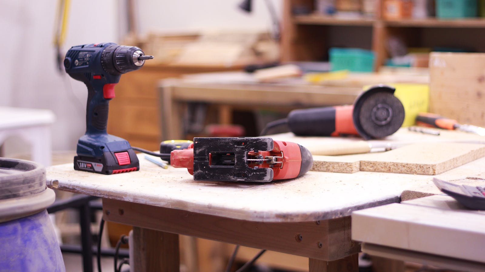 Assorted hand tools arranged on a workshop bench
